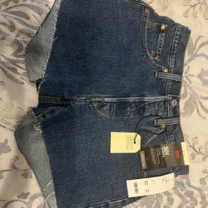 Levi’s 501 frayed cutoff shorts. Dark denim size 27. NWT